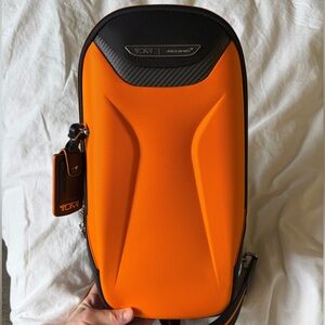 TUMI x McLaren Torque Sling Orange New w Tags